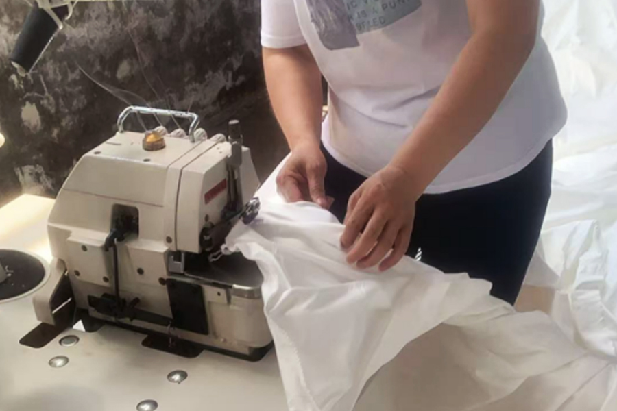 Pagtitina ng produksyon ng pabrika-kulay-abong tela na lugar ng pananahi sa ulo